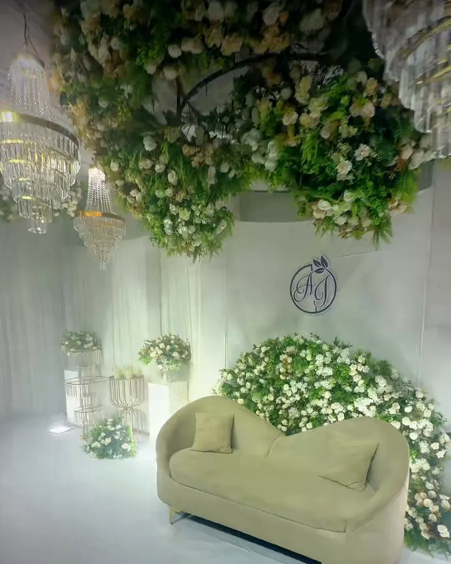 Floral stage under crystal chandeliers